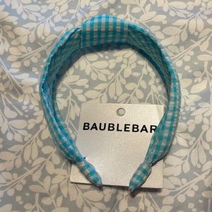 Blue/white headband. Never worn